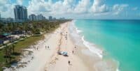 An aerial view of the beach and buildings in miami.